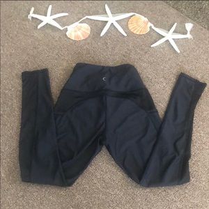 Zyia Black Leggings pocket and  Mesh Lace Sides.